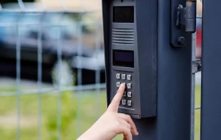 Little,Child,Boy,Pushes,A,Button,On,The,Intercom,Mounted