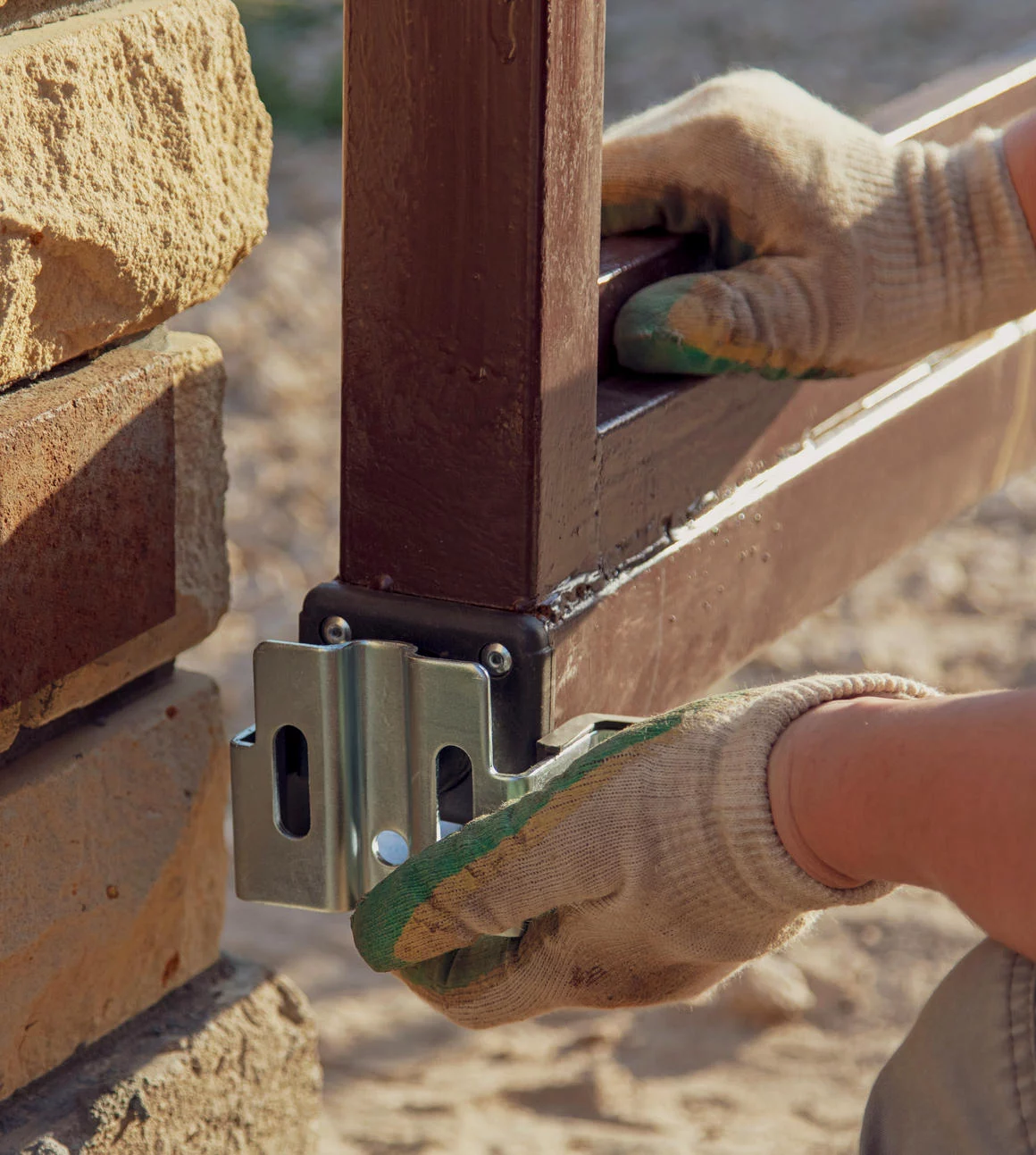 The,Worker,Installs,Rollers,On,The,Sliding,Gate