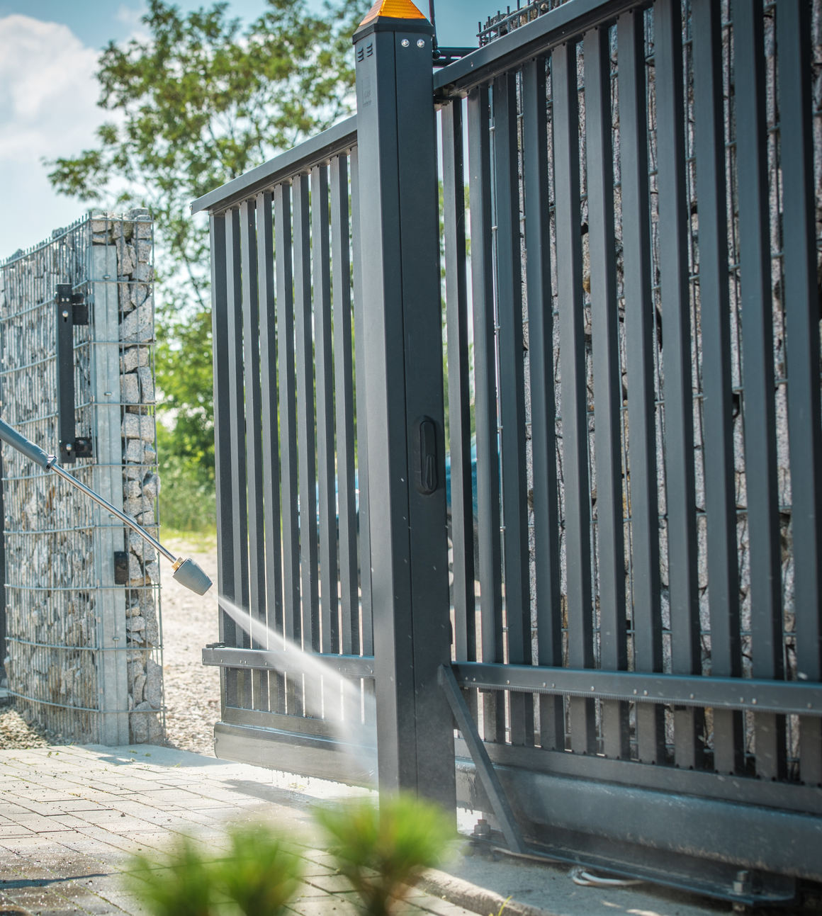 House,Driveway,And,The,Gate,Pressure,Washing,By,Caucasian,Men